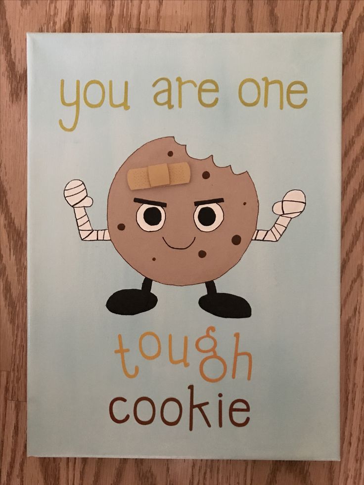 there is a sign with a cookie on it that says, you are one tough cookie