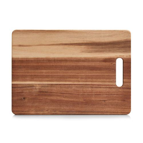 a wooden cutting board on a white background