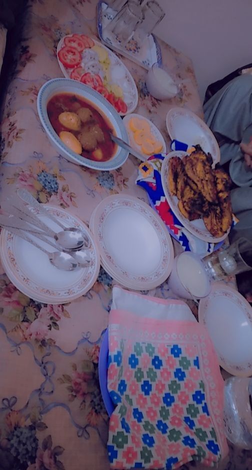 a table with many plates and bowls on it