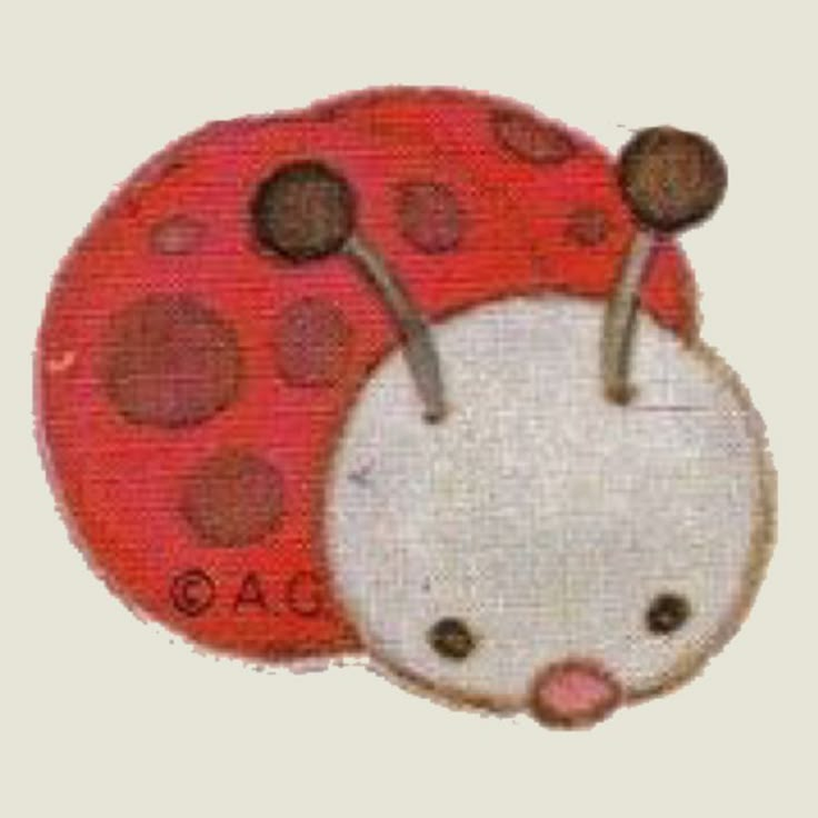 a red and white ladybug with black dots on it