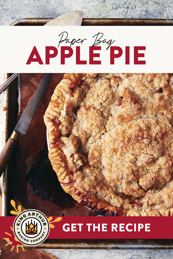 an apple pie on a baking sheet with a knife and fork next to it that says, pear berry apple pie get the recipe