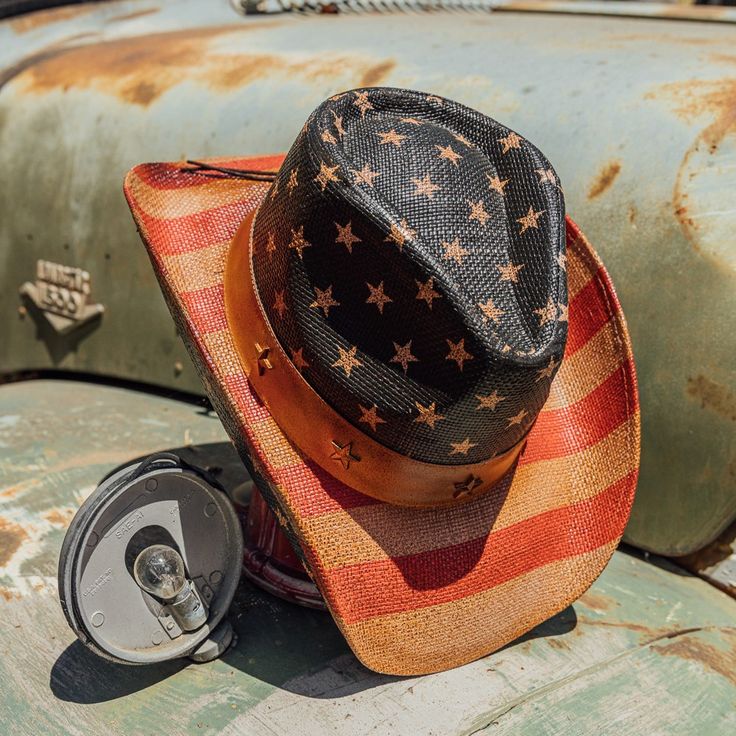 TX-704V from the Saddleback Collection is the perfect addition to your summer wardrobe. Crafted with genuine Toyo straw and genuine leather, this stylish hat features a shapeable wired brim and a 3.5 inch brim. Expertly adorned with a classic American flag pattern and star pins, this is a timeless piece that will elevate any look. Flag Pattern, Western Hats, Stylish Hats, Country Boys, Classic American, Summer Wardrobe, Timeless Pieces, American Flag, Straw