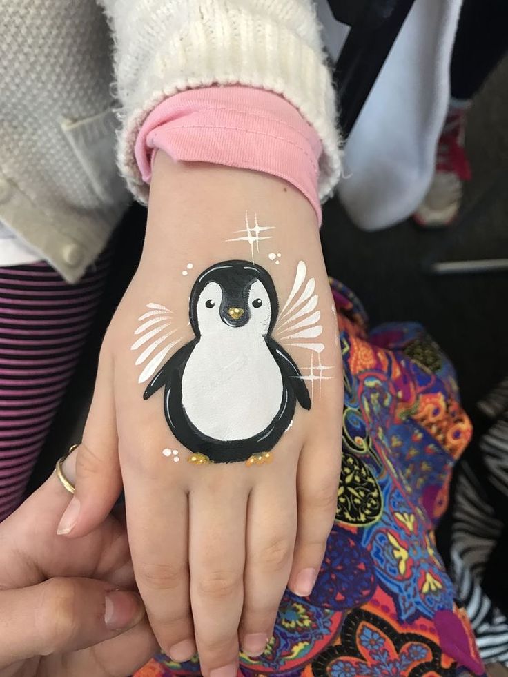 Penguin Face Paint, Face Painting Images, Orca Tattoo, Christmas Face Painting, Cheek Art, Girl Face Painting, Face Painting Tutorials, Arm Painting, Hamsa Tattoo