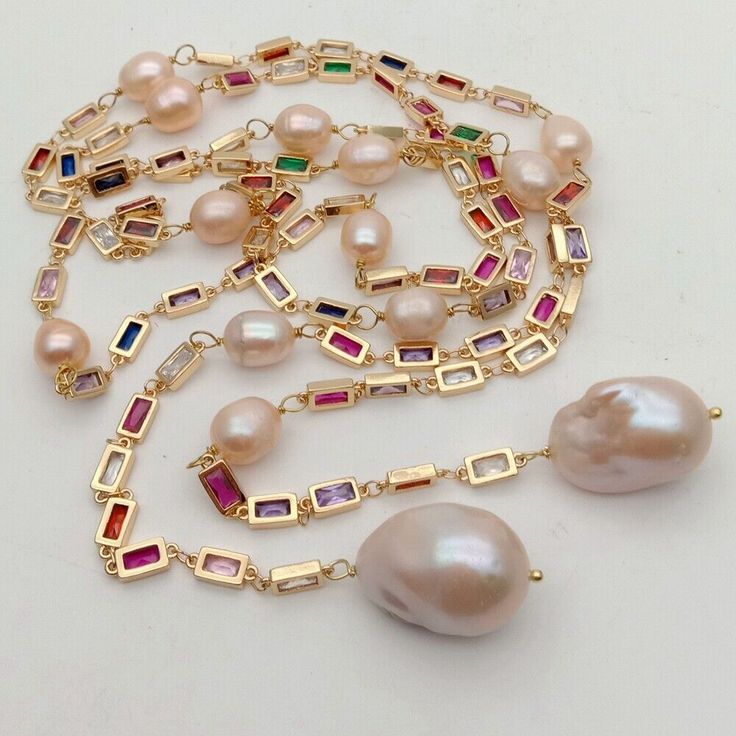 Gems Info:� Fresh water cultured pearl, pink potato pearl and keshi pearl, multi color rectangle Cz pave chain, good quality, high luster! Diameter:  16x24mm(keshi pearl), 9x11mm(pearl), 5x8mm(crystal). length:  50"(necklace).  Packing: Silk Pouch ******* Pearl Bangles Gold, Colar Chocker, Classic Pearl Necklace, Biwa Pearls, Pearl Chain Necklace, Freshwater Pearl Jewelry, Pearl Bangle, Kesha, Pearl Jewelry Necklace