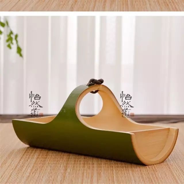 a wooden toy boat sitting on top of a table