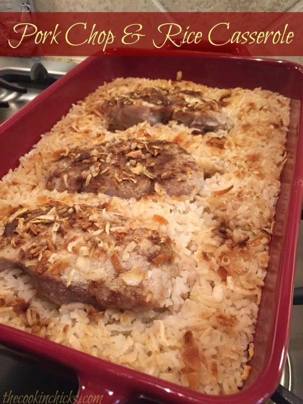 pork chops and rice casserole in a red dish