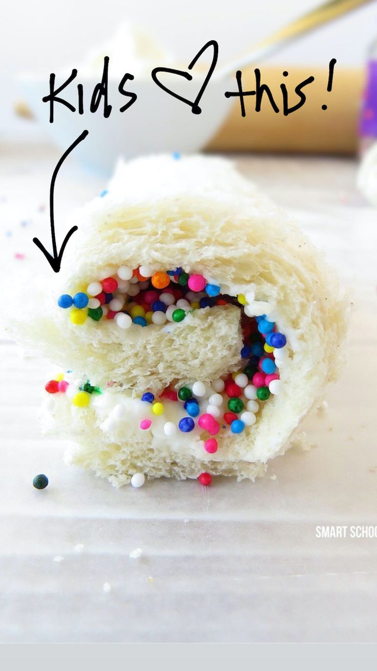 a roll with sprinkles and the words kids love this