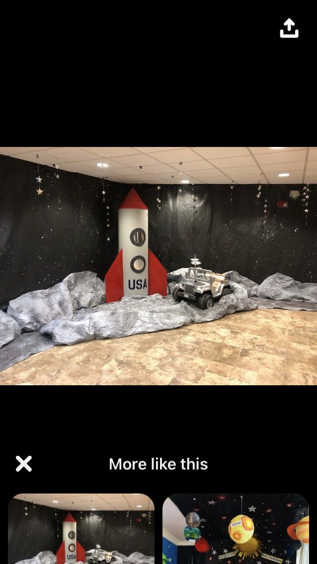 an image of a room that is in the shape of a rocket and some rocks