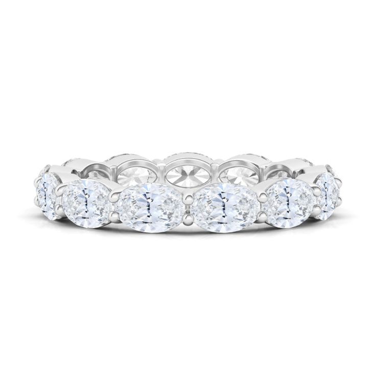 a white gold wedding band with round cut diamonds