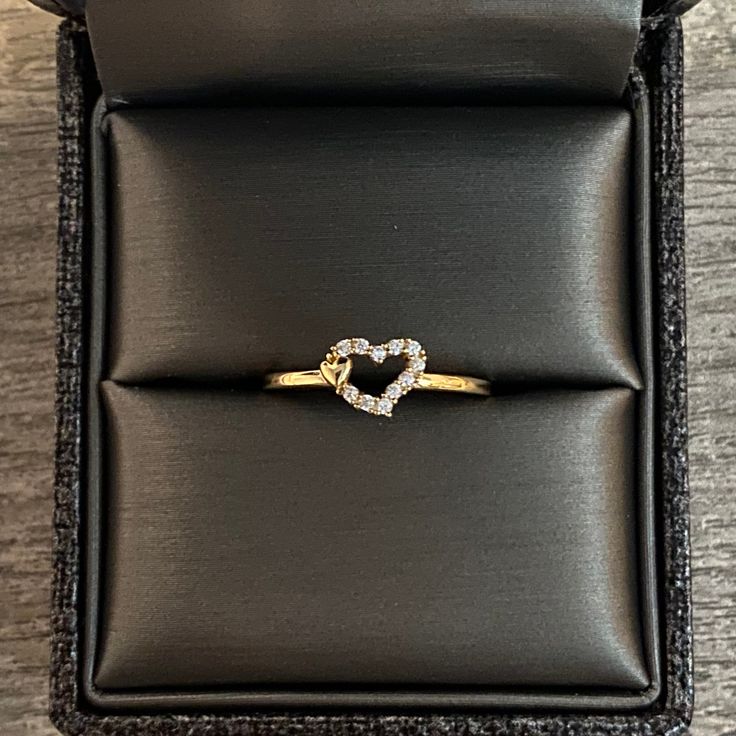 Includes: 14k Gold heart ring Ring weight: 1.34 grams. Ring measures: 1MM thickness Ring stones: Cubic zirconia Heart face measures: 6MM length, 7MM wide -When you order gold, every order has to be confirmed. -Make sure you put your correct email or phone number while you’re placing the order. -Read the entire item description to make sure it is the correct size you want. -Every order has insurance & signature required -If you’re unhappy with your purchase, we offer 7 day return Gold Heart Ring With Vs Clarity For Promise, Promise Heart Ring With Diamond Accents In Cubic Zirconia, Gold Heart Shaped Birthstone Promise Ring, Yellow Gold Heart Ring With Prong Setting For Promise, 14k Stamped Promise Heart Ring, Gold Heart Ring With Prong Setting For Promise, Gold Diamond Heart Ring As Gift, Gold Heart Cut Birthstone Ring For Promise, Open Heart Diamond Accented Promise Ring