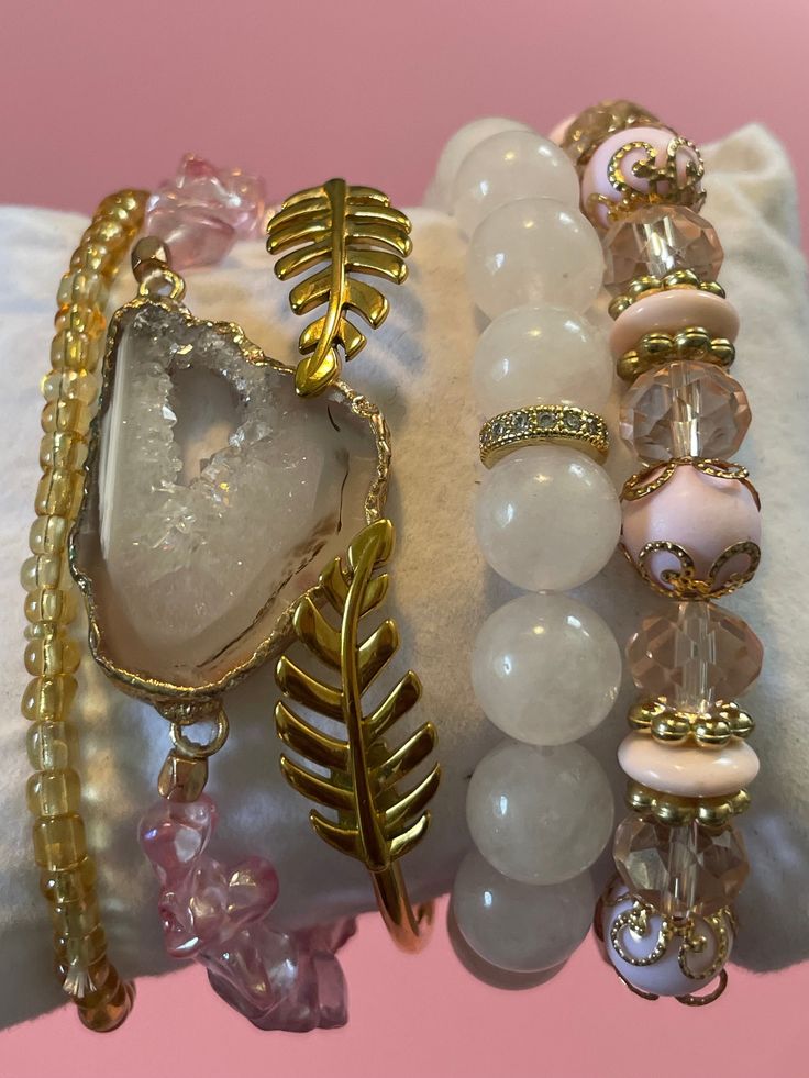 Gemstone Significance: Rose Quartz: Known as the stone of unconditional love, rose quartz promotes emotional healing, compassion, and harmony. It's believed to open the heart to all types of love and bring a sense of peace. Versatile Style: The Soft Life Natural Stone Bracelet Set adds a touch of elegance and warmth to any outfit. Ideal for special occasions, daily wear, or as a heartfelt gift, these bracelets offer versatility and style. Description: Embrace the soothing energy of the Soft Life Pink Gemstone Beads Bracelets For Healing, Spiritual Hand Wrapped Rose Gold Jewelry, Hand Wrapped Rose Quartz Beaded Bracelet As Gift, Handmade Rose Quartz Beaded Bracelets For Healing, Rose Quartz Beaded Crystal Bracelet As Gift, Spiritual Rose Gold Beaded Bracelets Gift, Rose Gold Beaded Bracelets With Gemstone Beads, Hand Wrapped Rose Quartz Jewelry In Rose Gold, Elegant Hand Wrapped Rose Quartz Jewelry