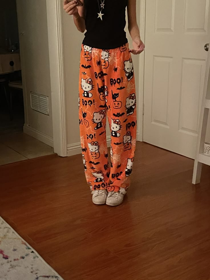 Halloween Pants Pjs, Cute Casual Halloween Outfits, Halloween Pj Pants Aesthetic, Hello Kitty Pjs Halloween, Flannel Trousers Outfit, Hello Kitty Halloween Pajama Pants, Fall Pajama Pants, Cozy Fall Pajamas, Fluffy Pyjama Pants