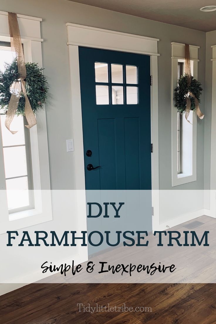 a blue front door with the words diy farmhouse trim simple and expensive