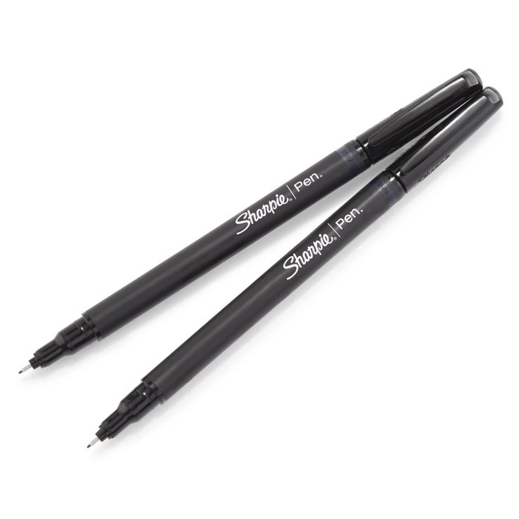 two black marker pens sitting next to each other