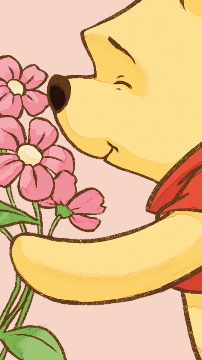 a winnie the pooh bear holding flowers in it's hand and kissing one another