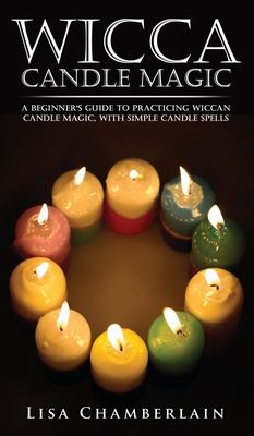 the wicca candle magic book is shown in front of a circle of lit candles