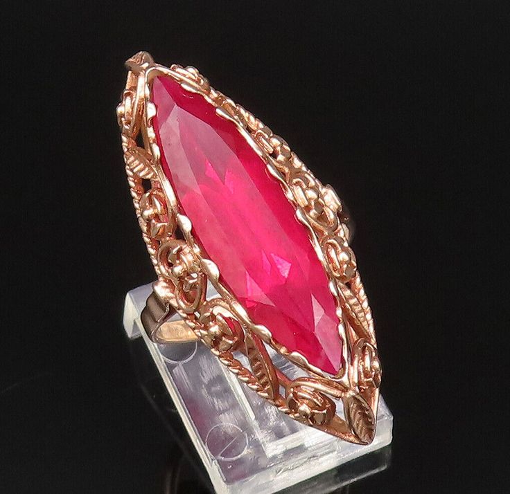 EAST EUROPE 14K GOLD - Vintage Victorian Red Stone Cocktail Ring Sz 9 - GR586 Jewelry Type:          Ring Metal Type:             14k Gold  Metal Size:              9 Finger Stone Type:             Red Stone  Condition:               N/A Jewelry Weight:      6.4 Grams PLEASE NOTE: THIS ITEM IS PRE-OWNED. ALTHOUGH MOST ITEMS ARE IN VERY GOOD CONDITION, SOME MAY NEED CLEANING AND/OR MINOR REPAIRS. WE MAKE A VERY STRONG EFFORT TO UPLOAD CLEAR PICTURES. PLEASE INSPECT ALL PICTURES AND ASK ALL QUESTIONS YOU MAY HAVE PRIOR TO MAKING A PURCHASE. NOT ALL STONES ARE GENUINE, SOME ARE ENHANCED OR CREATED. Antique Jewelry Rings, Clear Pictures, East Europe, Ring Metal, Vintage Victorian, Red Stone, Cocktail Ring, Cocktail Rings, Vintage Watches