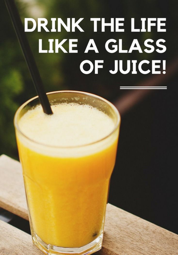 an orange juice in a glass with the words drink the life like a glass of juice