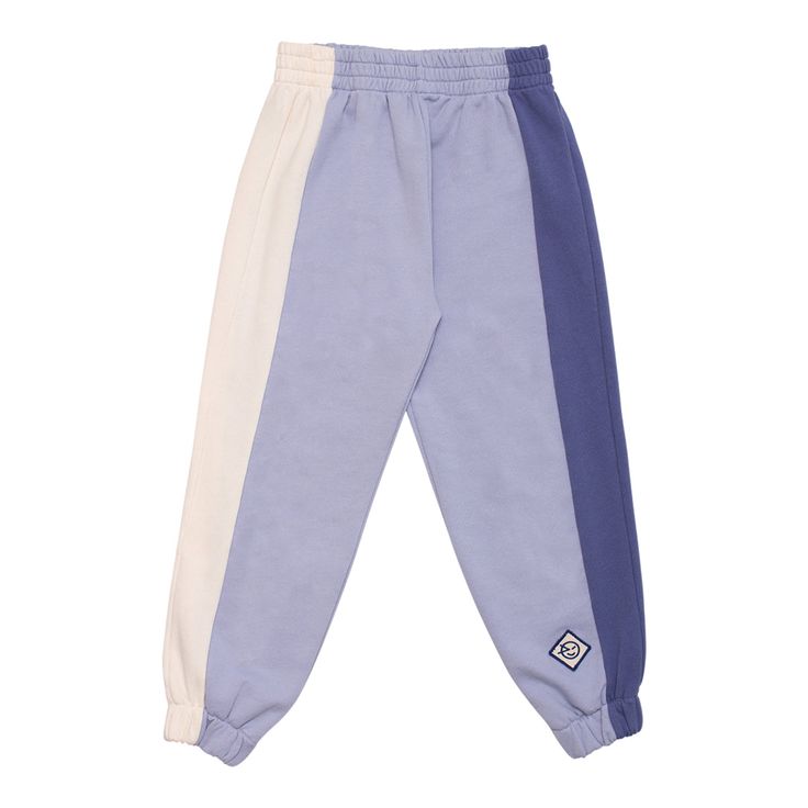 The Dusk Blue Chalk Side Panel Track Pant from Wynken. Blouson fit roomy track pant. Elasticated cuff and waist. Soft fleece jersey with contrast side leg panels. Blue Cotton Sweatpants With Ribbed Cuffs, Blue Relaxed Fit Bottoms With Ribbed Cuffs, Blue Bottoms With Ribbed Cuffs And Relaxed Fit, Blue Relaxed Fit Sweatpants With Ribbed Waistband, Blue Relaxed Fit Joggers With Ribbed Waistband, Blue Relaxed Fit Pants With Ribbed Cuffs, Blue Relaxed Fit Pants With Ribbed Waistband, Blue Joggers With Ribbed Waistband And Relaxed Fit, Blue Cotton Pants With Ribbed Cuffs