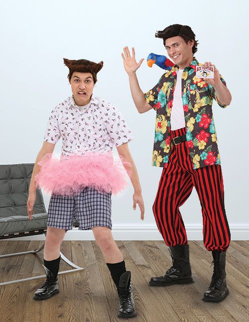 two men dressed in costumes standing next to each other on a hard wood flooring floor