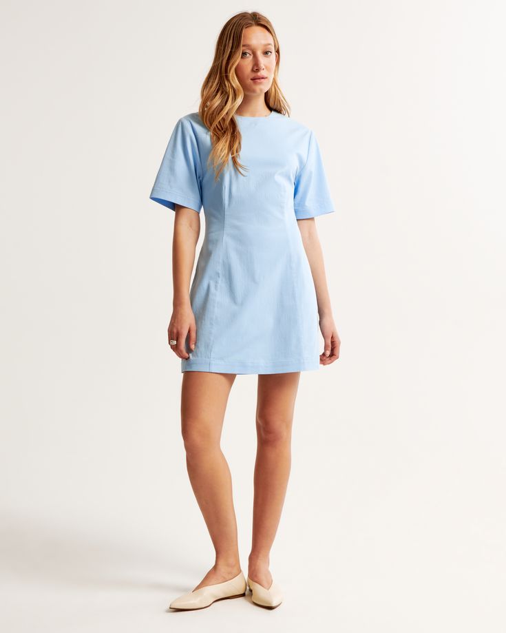 Elevate your wardrobe with the Abercrombie & Fitch Women's Stretch Tee Mini Dress, a perfect blend of comfort and chic style. This light turquoise dress is designed to flatter with its body-skimming silhouette and thoughtful seaming details along the bodice.

- Size: XXS TALL
- Color: Light Turquoise
- Material: Cotton, Elastane (lining)
- Gender: Female
- Features: Short sleeves, crew neckline, hidden back zipper closure

Ideal for both day and evening wear, this versatile piece promises elegan Knee-length Stretch Cotton Mini Dress, Spring Cotton Fitted Short Sleeve Dress, Fitted Cotton Short Sleeve Dress For Spring, Fitted Short Sleeve Cotton Dress For Spring, Fitted Short Sleeve Mini Dress For Daywear, Fitted Mini Length Short Sleeve Dress For Daywear, Relaxed Fit Short Sleeve Dress, Fitted Light Blue Cotton Dress, Knee-length Cotton Short Sleeve Dress