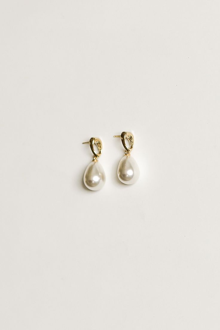 Affordable Gold Pearl Drop Bridal Earrings, Cheap Single Pearl Earring, Chic Pearl Drop Jewelry For Formal Occasions, Chic Formal Jewelry With Pearl Drop, Minimalist Pearl White Pearl Earrings For Formal Occasions, Modern Evening Pearl Drop Earrings, Timeless Pearl White Pearl Earrings, Minimalist Pearl White Formal Pearl Earrings, Formal Minimalist Pearl White Earrings