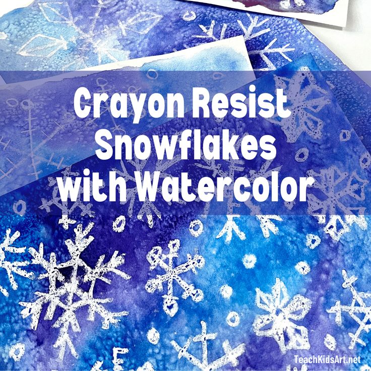 crayon resist snowflakes with watercolor on paper and some other crafting supplies