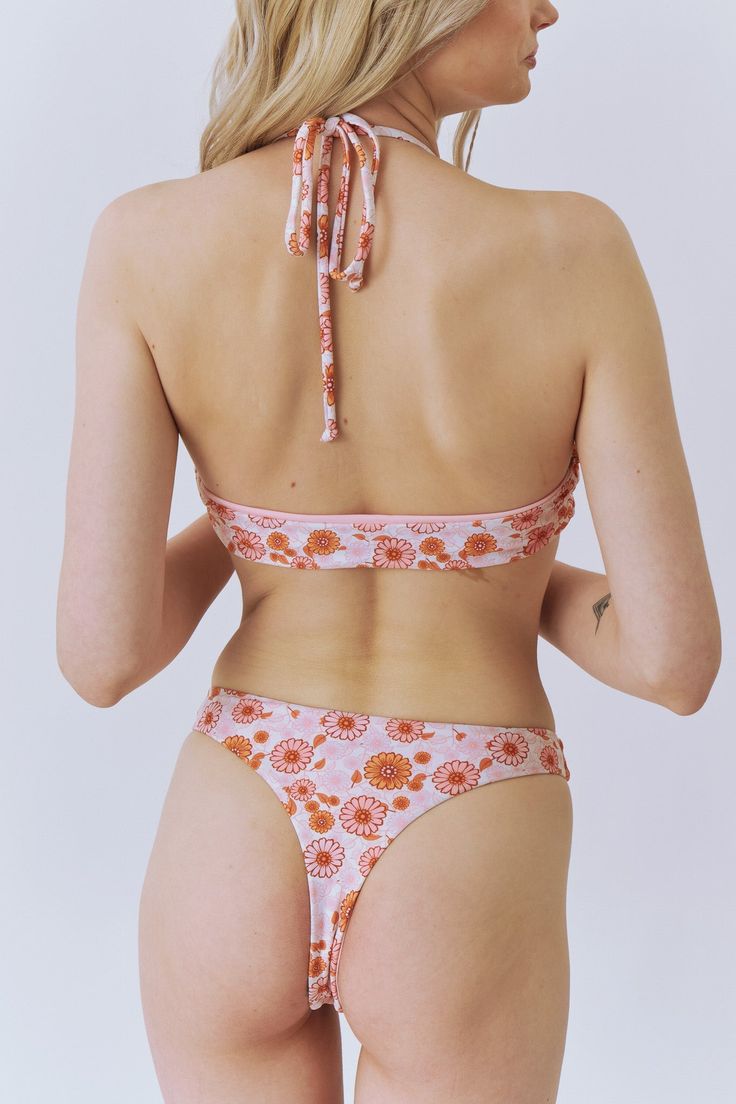 Crafted with our classic cheeky coverage, the Maisy Bikini Bottoms are a versatile staple that can be worn for any occasion. With an on-trend v-silhouette that accentuates all curves, this bikini bottom is simply unmatched. Pair it with the Maisy Top for an amazing look Feminine Fitted Swimwear For Sunbathing, Feminine Fitted Swimwear For Beach Party, Feminine Stretch Swimwear For Pool, Pink Swimwear With Moderate Back Coverage For Summer, Feminine Triangle Top Swimwear For Poolside, Feminine Triangle Top Swimwear For Beach Season, Pink Swimwear With Moderate Back Coverage For Beach, Feminine Triangle Top Swimwear For Pool, Feminine Stretch Swimwear For Poolside