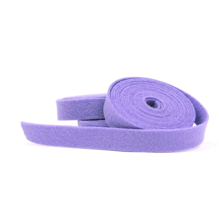 a roll of purple cloth on a white background