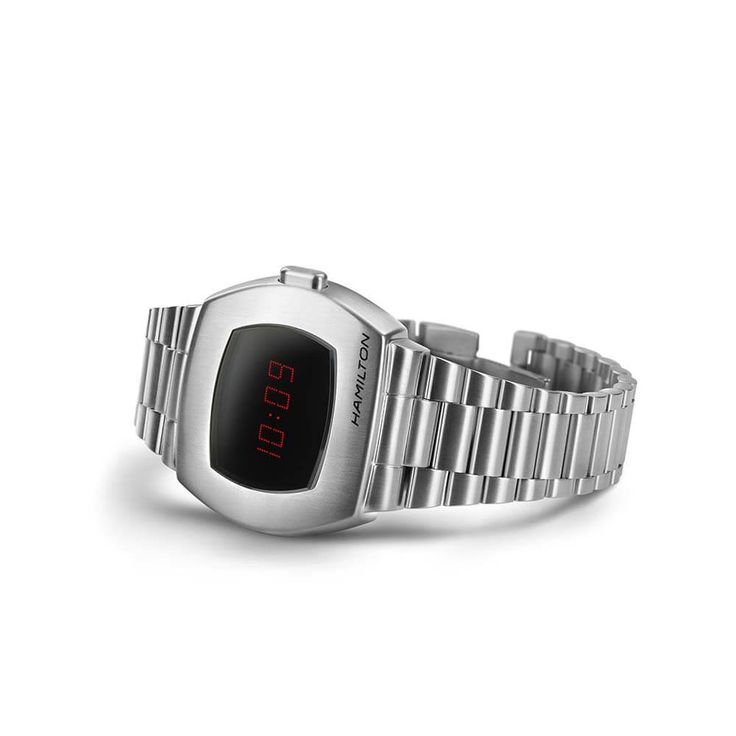 In 1970, Hamilton changed the way the world told time with the debut of the Hamilton Pulsar. Fifty years later, the Hamilton PSR celebrates the launch of that revolutionary first digital watch. Today, a hybrid display and a stainless steel case bring this game-changing invention back to the future. Modern Silver Digital Watch With Stopwatch, Modern Silver Stopwatch Watch Accessories, Modern Silver Watch Accessories With Stopwatch, Modern Watches With Stopwatch And Rectangular Dial, Modern Digital Watch With Metal Dial, Modern Digital Watch With Subdials And Rectangular Dial, Modern Digital Watch With Rectangular Dial, Retro Silver Watch Accessories With Date Display, Modern Silver Digital Watch