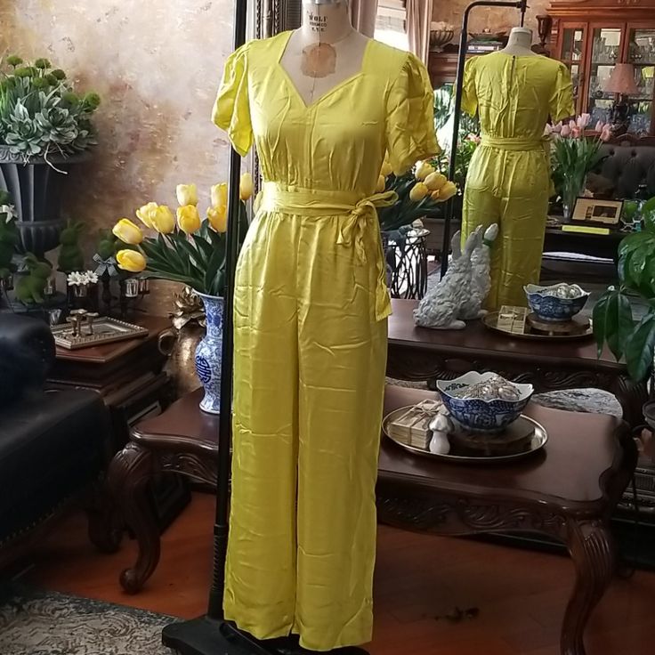 New, Never Worn. Pockets At Sides, Zipper At Back. Color Most Resembles Last Photo Sash Belt Included And Shown, One Belt Loop Is Ripped From The Seam But Not Necessary To Hold The Belt In Place. No Care/Content Labels Elegant Yellow Jumpsuits And Rompers For Work, Elegant Yellow Jumpsuits For Workwear, Elegant Yellow Fitted Jumpsuits And Rompers, Elegant Fitted Yellow Jumpsuits And Rompers, Elegant Fitted Yellow Jumpsuit, Yellow V-neck Jumpsuits And Rompers For Work, Spring Yellow Jumpsuits And Rompers For Workwear, Yellow Jumpsuits And Rompers For Spring Workwear, Yellow Fitted Jumpsuit With Short Sleeves