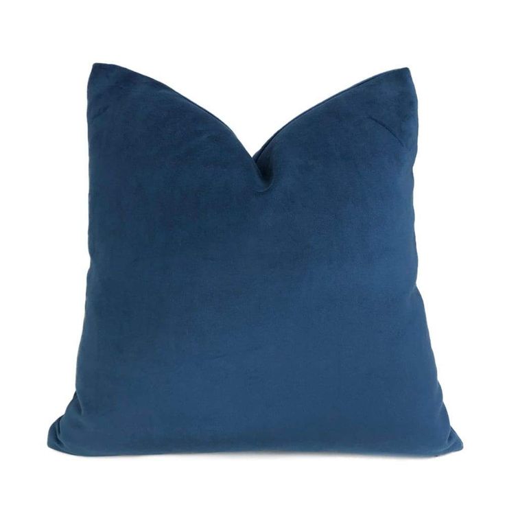 a dark blue pillow with a square shape on the front and back, sitting on a white background