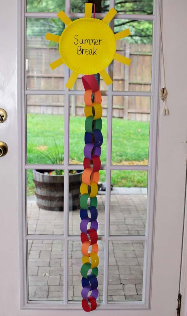 a door with a sign on it that says summer is here and rainbows are everywhere