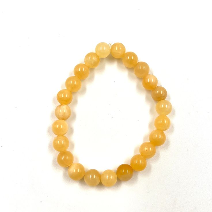 Yellow Jade provides emotional positivity, increased communication, and a sense of self-worth. It also helps to improve communication. Known to bring feelings of serenity and balance, Yellow Jade helps restore mental equilibrium and emotional wellbeing. Its properties also aid in better communication and a heightened sense of self-worth. It is associated with the Solar Plexus (3rd) chakra. *Crystal color, size or shape may vary from image. Affordable Adjustable Yellow Stretch Bracelet, Cheap Trendy Yellow Stretch Bracelet, 3rd Chakra, Better Communication, Intention Candles, Yellow Jade, Improve Communication, Emotional Wellbeing, Solar Plexus