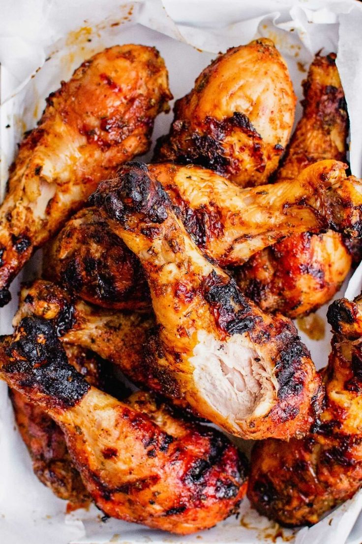 grilled chicken wings in a basket ready to be eaten