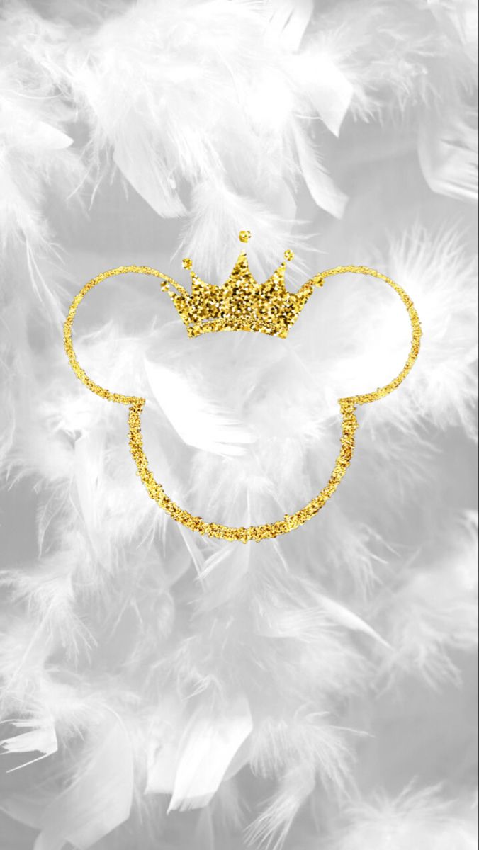 a gold mickey mouse head with a crown on it's head, surrounded by white feathers