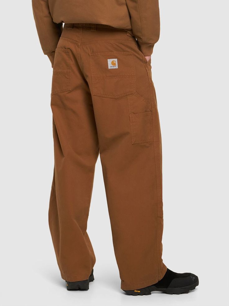 Front button and concealed zip closure. Logo details. Hammer loop. Two front pockets. Two side pockets. Two back pockets. Model is wearing a sizeM Streetwear Bottoms With Welt Pockets And Straight Hem, Classic Pants With Side Pockets For Streetwear, Brown Straight Leg Pants With Pockets, Brown Straight Leg Bottoms With Side Pockets, Brown Bottoms With Side Pockets For Fall, Streetwear Pants With Patch Pockets And Straight Hem, Fall Streetwear Cargo Pants With Welt Pockets, Utility Pants With Welt Pockets For Streetwear, Workwear Cargo Pants With Hidden Pockets And Straight Leg