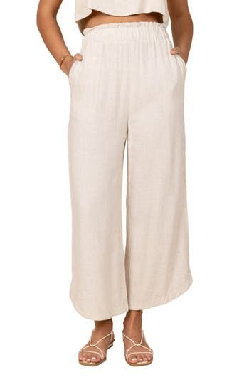 Easy and polished, these elastic-waist pants are crafted from lightweight linen with flowy wide legs. Elastic waist Side pockets Unlined 100% linen Hand wash, dry flat Imported Beige Linen Bottoms With Elastic Waistband, Chic Linen Bottoms With Elastic Waistband, Beige Linen Pants With Elastic Waistband, Vacation Linen Wide-leg Bottoms, Solid Linen Pants For Vacation, Linen Bottoms With Elastic Waistband And Loose Fit, Beige Linen Casual Harem Pants, Casual Beige Linen Harem Pants, Relaxed Linen Bottoms In Neutral Color