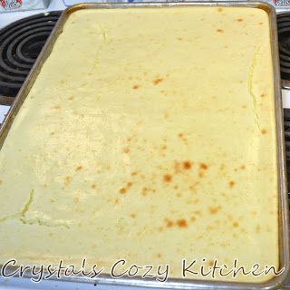 a pan filled with food sitting on top of a stove