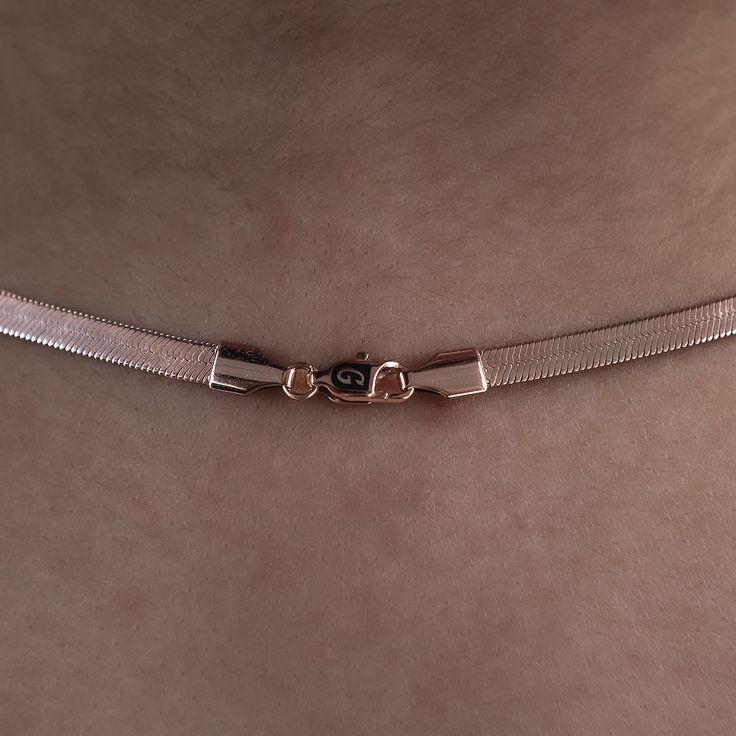 Introducing the Herringbone Necklace- 4mm, now in 14k Rose Gold! This sleek chain is sure to become your next staple piece adding just enough style and simplicity to any look. Featuring a classic herringbone pattern, this piece reflects light from every angle and complete with our signature 'G' clasp. Rock it solo, or pair it with the Herringbone Bracelet in Rose Gold for a matching set! This product is guaranteed for life - GLD will repair the item should you experience any defects in craftsman Tarnish Resistant Rose Gold Snake Chain Jewelry, Minimalist Rose Gold Snake Chain Jewelry, Classic Rose Gold Necklace With Lobster Clasp, Classic Rose Gold Snake Chain Jewelry, Elegant Rose Gold Chain Necklace With Lobster Clasp, Rose Gold Clavicle Snake Chain Jewelry, Minimalist Rose Gold Snake Chain Necklace, 14k Rose Gold Snake Chain Necklace, Everyday Rose Gold Snake Chain Necklace