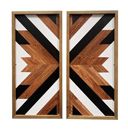 two wooden doors with black and white designs on them