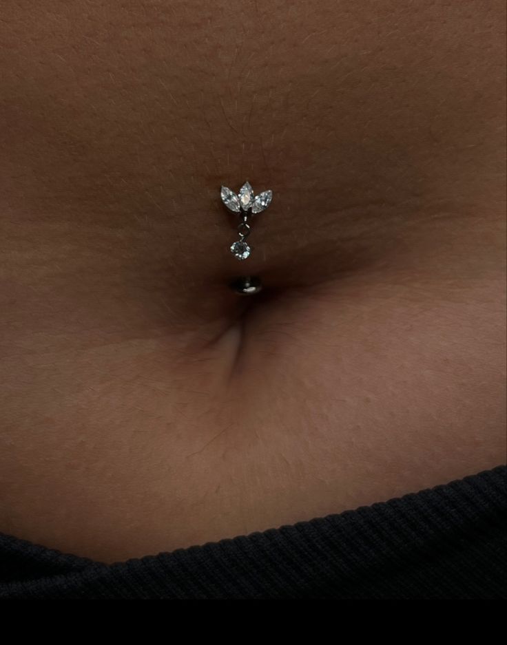 Floating navel piercing using implant grade titanium. She’s rocking a cz fan with a small charm. Floating Navel Jewelry, Floating Navel Piercing Jewelry, Floating Piercing, Tummy Piercing, Floating Navel Piercing, Naval Piercings, Floating Navel, Ear Styling, Navel Piercing Jewelry