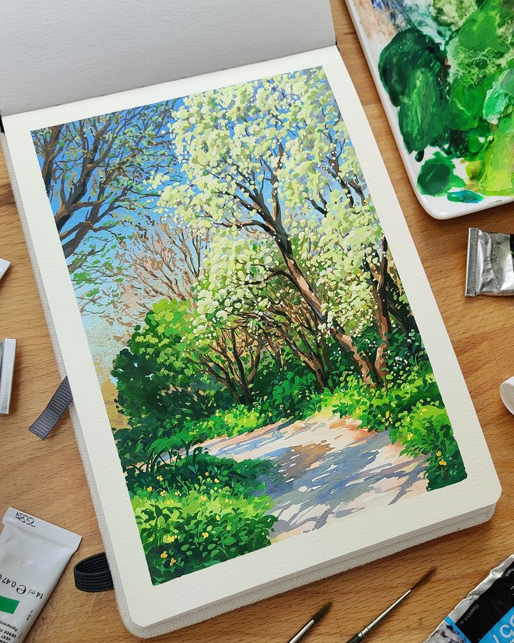 Photo of a sketchbook laid out on a desk surrounded by brushes and gouache paint tubes. The painting shows a pathway through trees and foliage on a sunny spring day. Gouache Painting Techniques, Gouache Landscape, Water Color Markers, Gouache Tutorial, Dutch Landscape, Paint With Me, Environment Painting, Gouache Illustrations, Posca Art