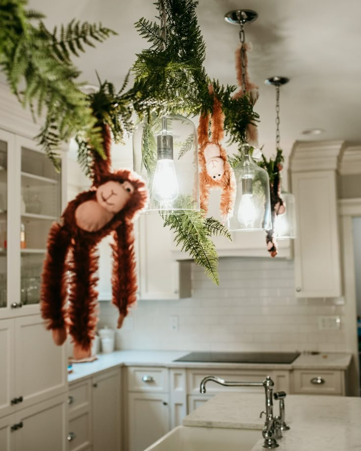 a kitchen filled with lots of plants and hanging decorations