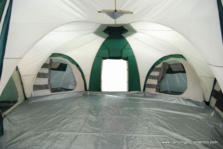 the inside of an inflatable tent with several windows