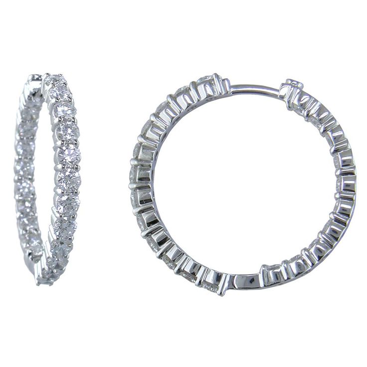 18K White Gold 28mm Diamond Hoop Earrings Approx. 3.43 total carat Approx. 28mm NAGI Jewelers is an Authorized Roberto Coin Retailer 18K White Gold 44 Round Diamonds = 3.43 Carats tw F-G Color / VS Clarity 28mm Diameter(1 1/8") Hinged post backs Signature Ruby on end tips 3mm wide Weigh 8.8 grams Made in ITALY Available for order. (Orders Placed today will ship in approximately 4 - 6 week.) Roberto Coin, Diamond Hoop Earrings, Jewelry Store, Jewelry Stores, Diamond Bracelet, Round Diamonds, Hoop Earrings, White Gold, In Italy