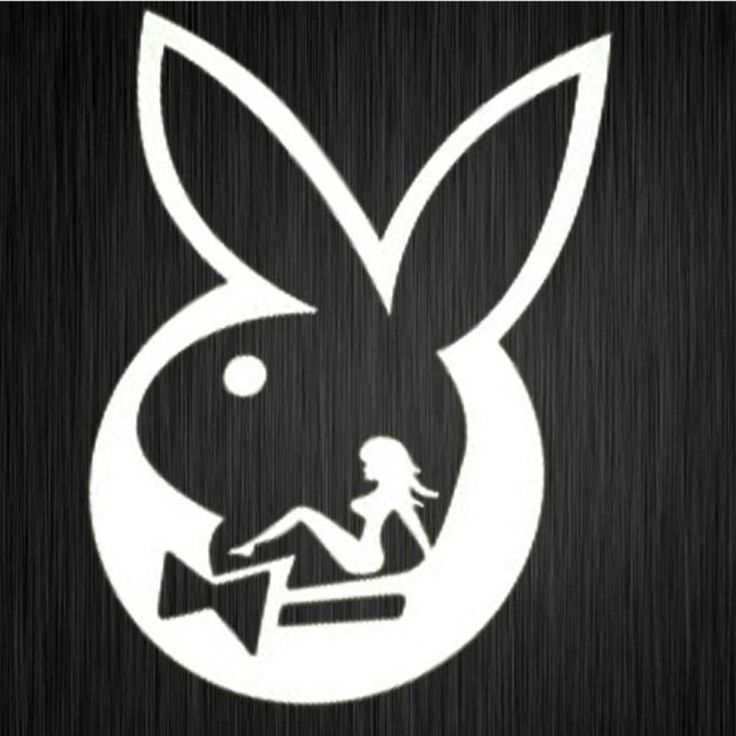 an image of a woman sitting on the ground in front of a black background with white rabbit