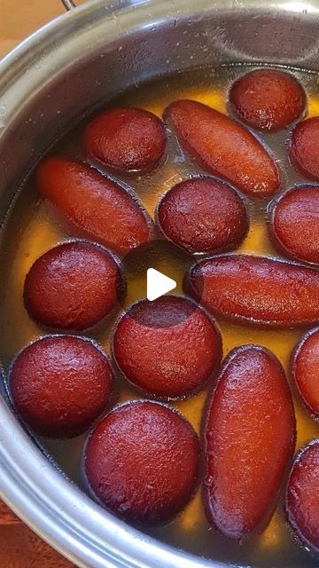 the food is being cooked in the pot on the stove