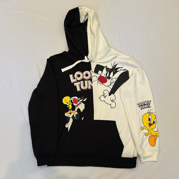 Looney Tunes Girl’s Hooded Sweatshirt. Black And White With Sylvester And Tweety Bird. Center Front Pocket. M (7-9). New Without Tags. Casual Character Print Hoodie Tops, Fun Black Hoodie For Winter, White Fun Winter Hoodie, Casual Black Sweatshirt With Character Print, Playful Fall Streetwear Tops, Cute Black Hoodie With Graphic Print, Black Letter Print Fun Sweatshirt, Trendy Cartoon Print Hoodie Top, Fun White Winter Hoodie