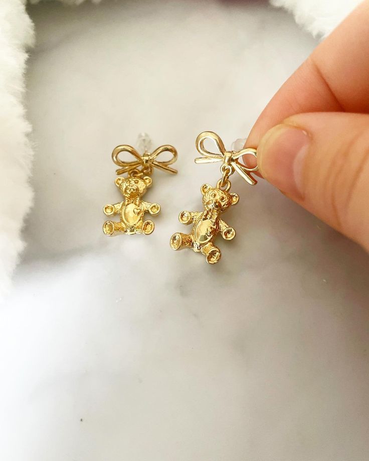 Gold teddy bear earrings with bow Earring style: dangle  Theme: teddy bear  Colour: gold Gold Teddy Bear, Teddy Bear Earrings, Bow Earring, Preppy Things, Bear Earrings, Bow Earrings, Etsy Earrings Dangle, Fashion Earrings, Jewelry Earrings Dangle